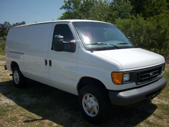 2007 FORD E250 CARGO VAN white nice adrian steel drawers  shelves on both sides you will have n