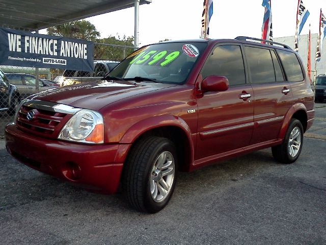 2005 SUZUKI XL-7 red 4wdawdabs brakesair conditioningalloy wheelsamfm radioanti-brake syste