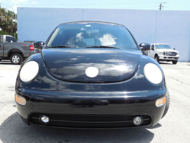 2003 VOLKSWAGEN NEW BEETLE GLS 18L CONVERTIBLE tan lthr abs brakesair conditioningalloy wheel
