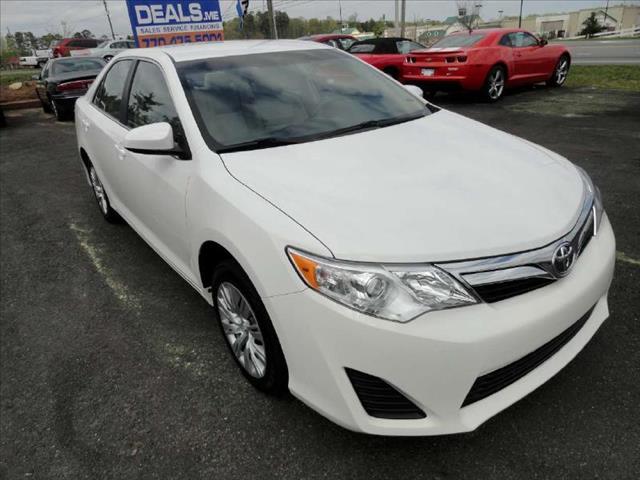 2012 TOYOTA CAMRY LE white come and check it out today lowest prices in the state you wont find