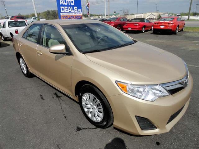 2012 TOYOTA CAMRY LE gold come and check it out today lowest prices in the state you wont find 