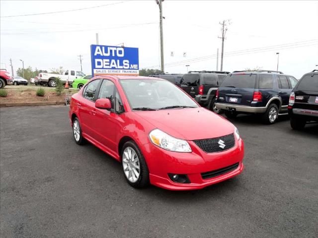2011 SUZUKI SX4 SPORT SEDAN red come and check it out today lowest prices in the state you wont